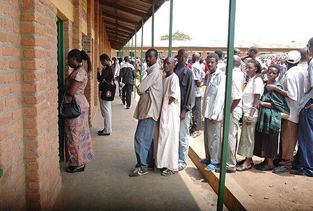 Voters line up to cast their vote in Kigali City in a past election. City residents have been urged to participate massively (File Photo)