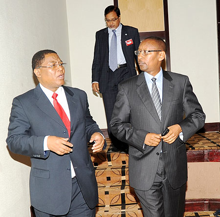 COMESA Secretary General Sindiso Ngwenya (L) talks to Finance Minister John Rwangombwa at a COMESA Fund meeting in Kigali on Wednesday. 