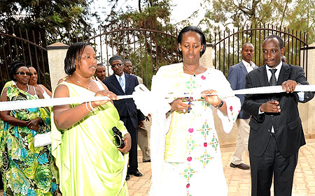 First Lady Jeannette Kagame (C) flanked by Health Minister Richard Sezibera (R) and AVEGA Chairperson, Chantal Kabasinga, officially inaugurating AVEGA Clinic yesterday. (Photo: J. Mbanda)