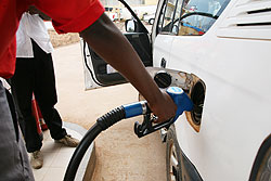A vehicle being fueled at one of the petrol stations in Kigali