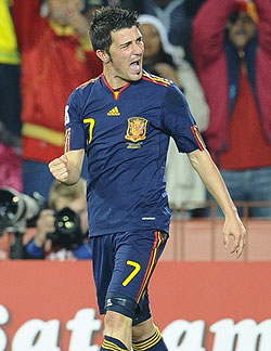Spainu2019s striker David Villa celebrates after scoring against Paraguay.