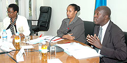 L-R Angelina Muganza, Alphonsine Mirembe, Minister of Labour, Anastase Murekezi, during the press conference yesterday ( Photo; F. Goodman)