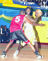 KBCu2019s Fiston Muhire (with the ball) averaged 20 points in the first round. (File Photo)