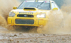 Giancarlo powers his Subaru during last yearu2019s national rally championship. (File Photo)