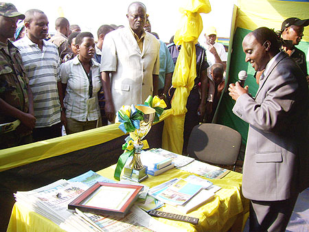 Gicumbi Mayor Nyangezi, outlines the districtu2019s achievements while addressing guests at the district exhibition stand. (Photo: A.Gahene)