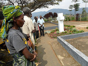 Survivors and members of RAFA pay respects to genocide victims at Karama genocide memorial site (Photo by J C Gakwaya)