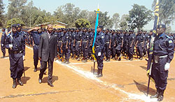 Minister Musa Fazil Harerimana inspecting a guard of honour mounted by the police constables who passed out yesterday (Photo; S. Rwembeho)