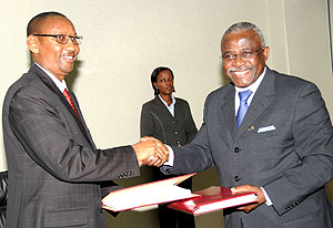  Finance Minister John Rwangombwa and IFAD President Dr. Kanayo Nwanze after signing. (Photo J Mbanda)