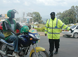 A traffic policeman on duty in Kigali city. Transparency Rwanda has called for the amendment of traffic legislation (File Photo)
