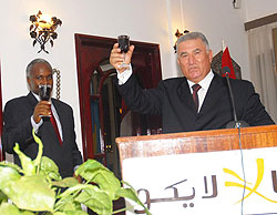 Minister of Education, Charles Muligande, toasts with the Egyptian Ambassador, Ahmed Rami, during the celebrations at the Egyptian Embassy. (Photo F. Goodman)