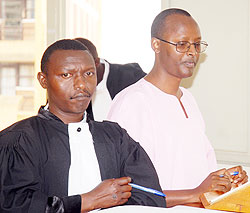 Deo Mushayidi (L) appearing before court yesterday (Photo; F. Goodman)