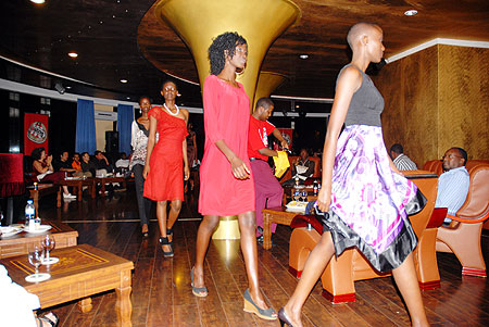 A cross selection of Rwandan and Kenyan models do a catwalk during the event. 