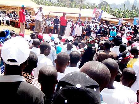 Prime Minister Makuza (in white top) campaigns for Kagame in Tumba Sector, Huye district yesterday. (Photo P. Ntambara)