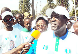 PSD presidential candidate, Dr. Jean Damascene Ntawukuliryayo (Right) speaks to the media after the Kamonyi rally. Photo D.Sabiiti.