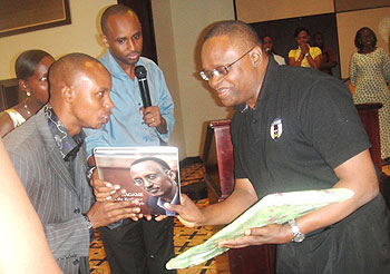 Youth presents gifts to Prof. Vicent C. Anigbogu in appreciation for inspiring them(Photo Eugene Mutara)
