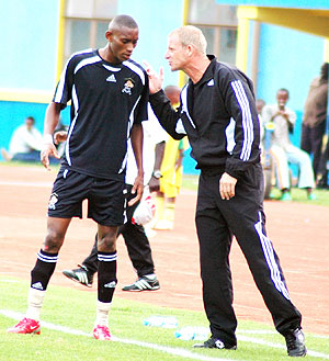 Jean Baptiste Mugiraneza takes a message from his coach Erik Paske during last seasonu2019s league clash against rivals Kiyovu. (File photo)