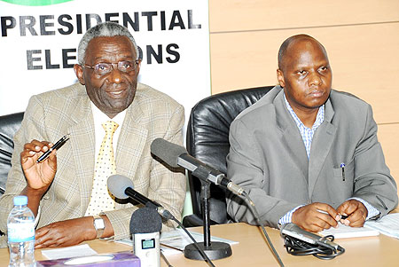 NEC Chairman, Chrysologue Karangwa (L)  announced the results yesterday as Executive Secretary, Charles Munyaneza looks on. (Photo / J. Mbanda)