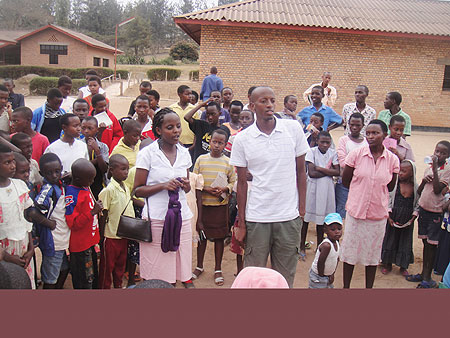 Orphans with their care takers at SOS primary school yesterday (Photo; E. Mutara)