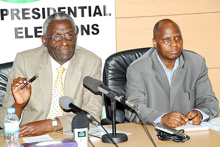 NEC Chairman Chrysologue Karangwa (L) and Executive Secretary Charles Munyaneza announcing presidential election results on Wednesday  (Photo J Mbanda)