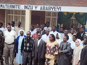 Officials pose for a group picture at Busogo maternity block after its provisional opening. (Photo B Mukombozi)