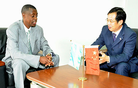 Defence Minister James Kabarebe (L) with Chinese Ambassador to Rwanda, Sun Shuzhong. (Photo J Mbanda)