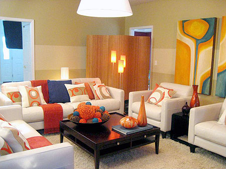 A living room arrangement with a complementary colour scheme with a neutral base