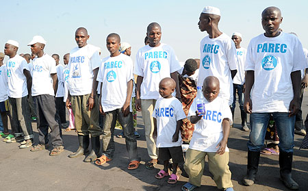 Some of the former FDLR comabatants and rtheir families on arrival at Kanombe Airport Yesterday