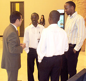The Chinese Ambassador speaking to some of the students (Photo: C. Kwizera )