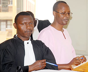 Deo Mushayidi (L) appeared in court yesterday.
