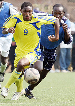 Amavubi striker Emmanuel Sebanani a.k.a Crespo runs for the ball in yesterdayu2019s friendly against Police. The match ended in a 2-all draw. (Photo: E. Niyoshuti)