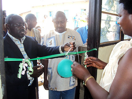 10-1Mayor of Nyaruguru Sibomana and Francis Karake of ActionAid inaugurating the new classrooms at Gahotora Primary School (Photo: J. Gakwaya)