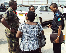 RPC Chief Supt Bosco Rangira and Brig. Gen Wilson Gumisiriza share a light moment with other local leaders shortly before the meet. (Photo: S. Nkurunziza)