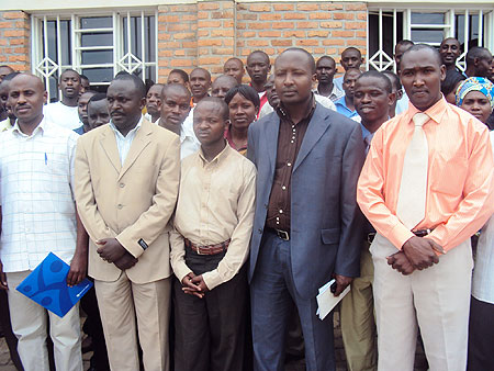 District and UNAIDS officials pose for a photo in Nyamata on Wednesday. (Photo S. Rwembeho.)