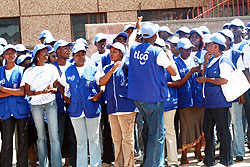 Tigo vendors share a light moment last year (File Photo)