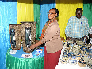 local business woman shows off a creatively made radio at the ongoing International Trade Fair (Photo; J. Mbanda)