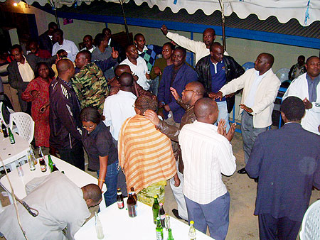 Mayor Nyangezi dancng with medical prsonnel during celebrations to mark RPF victory. Photo A.Gahene