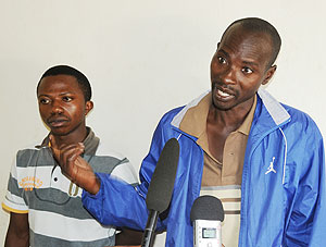 L-R Shem Nicayembizi and Bosco Ntakiyimana arrested for counterfeit and held at Muhima Police station. (photo T. Kisambira)