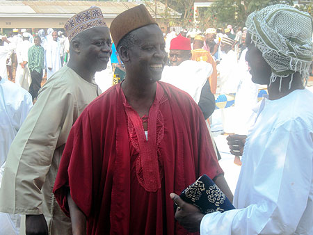 Sheikh Jusuf Bizuru (C) chatting with Ahamid Badal (R) after the prayers (Photo S. Rwembeho)