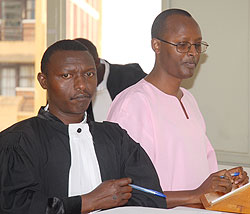 SENTENCED TO LIFE; Deo Mushayidi (R) appearing before court recently (File photo)