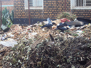 Scavengers on a garbage pile near a market in Rwamagana town (Photo; S. Rwembeho)