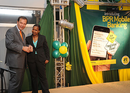 Ben Kalkman, BPR CEO and Pichette Sayinzoga, PS Ministry of Finance during the launch (Photo T. Kisambira)