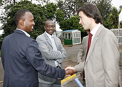Ferwfau2019s CEO JUles Kalisa (L) and Bralirwau2019s Commercial Director Alexander Koch (R). Looking on in the middle is Sports minister Joseph Habineza. (File photo)