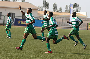Kiyovuu2019s defender Marcel Lomami (L) celebrates after netting the winner against APR in the Primus Cup semi-final. (File  photo)