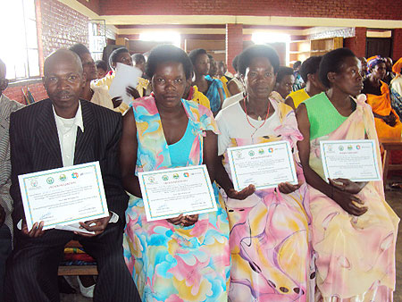 Excited farmers receive certificates after completion of the training.Photo B Mukombozi