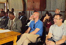 The visiting EU delegation listening to testimonies of ex-combatants at Mutobo (Photo; B. Mukombozi)
