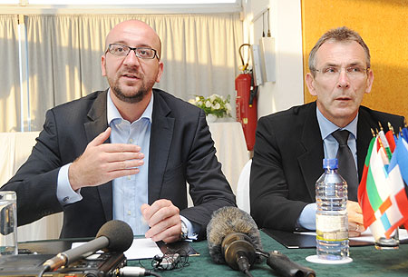 Charles Michel the Belgian Ambasodor and Andris Piebalgs the EU commisioner for Development at a press conference on Thursday (Photo T.Kisambira)