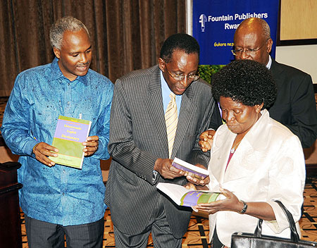 (L-R) Dr. Charles Murigande, Prof. Geoffrey Rugege and Ugandau2019s Minister of Education, Geraldine Bitamazire during the launch of the dictionary (Photo; T. Kisambira)