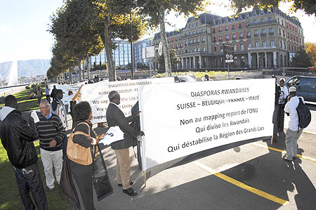 Some of the demonstrators hold banners on the streets of Geneva (Courtesy photo)