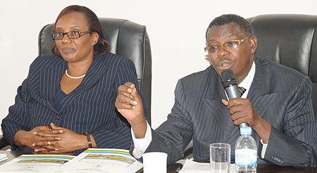Deputy Speaker Denis Polisi (R) addressing the press conference as speaker Rose Mukantabana looks on (Photo; J. Mbanda)
