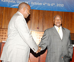 The Minister of Local Government, James Musoni (L) with President Yoweri Museveni at the conference (Photo; E. Kabeera)